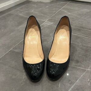 Christian Louboutin black patent pumps size. 36.5